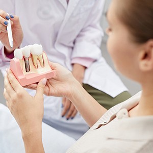 A woman at a dental implant consultation