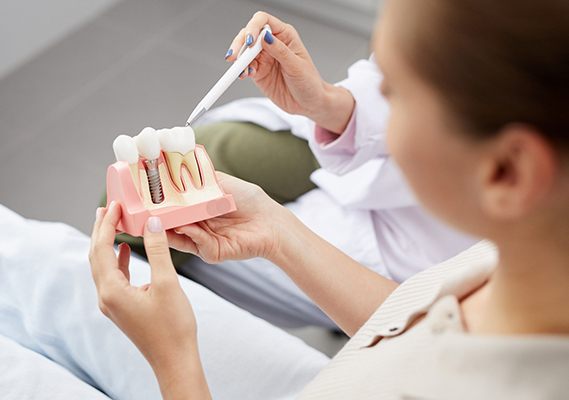 A woman at a dental consultation