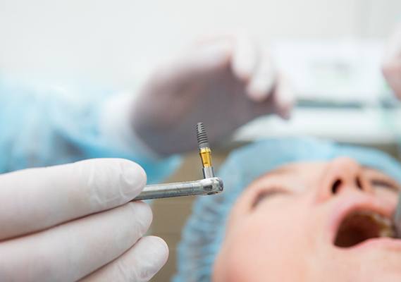 A patient having dental implant surgery