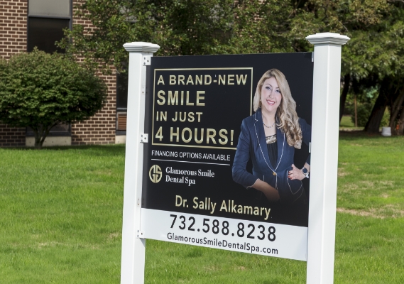 Sign outside of Neptune dental office